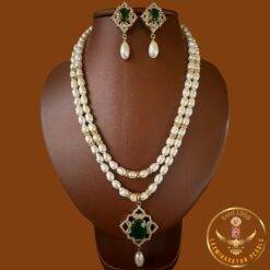two line pearl set jewellery with green stone