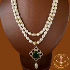 two line pearl set jewellery with green stone