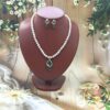 green pendant pearl necklace