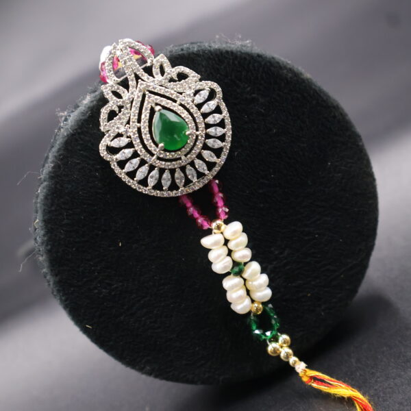 Emerald Charm Pearl Rakhi - Image 3