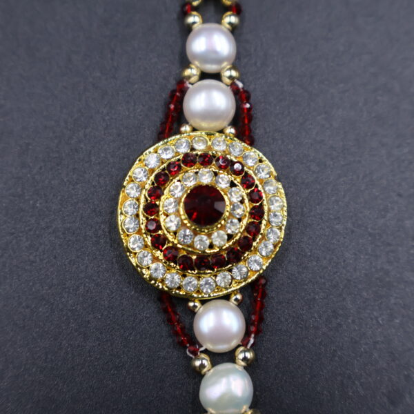 Crimson Elegance Pearl Rakhi - Image 4