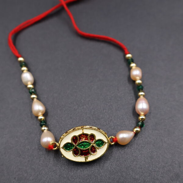 Traditional Elegance Pearl Rakhi - Image 4